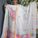 With Gujarati dress