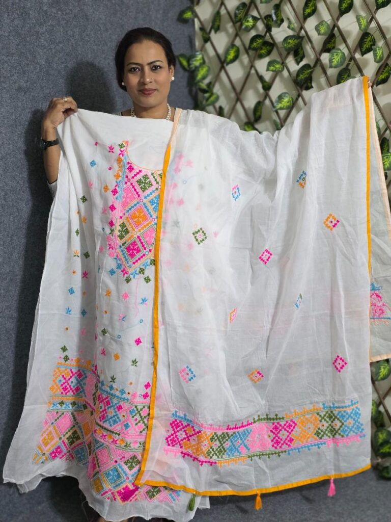 With Gujarati dress